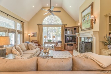 Nestled among mature trees and overlooking Wynlakes Golf Course on Wynlakes Golf and Country Club in Alabama - for sale on GolfHomes.com, golf home, golf lot