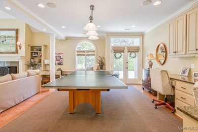 Nestled among mature trees and overlooking Wynlakes Golf Course on Wynlakes Golf and Country Club in Alabama - for sale on GolfHomes.com, golf home, golf lot