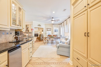 Nestled among mature trees and overlooking Wynlakes Golf Course on Wynlakes Golf and Country Club in Alabama - for sale on GolfHomes.com, golf home, golf lot