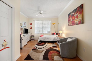 Welcome to this charming 3-bedroom, 2-bathroom WATERFRONT home on East Lake Woodlands Country Club in Florida - for sale on GolfHomes.com, golf home, golf lot