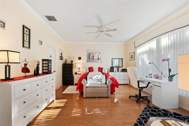 Welcome to this charming 3-bedroom, 2-bathroom WATERFRONT home on East Lake Woodlands Country Club in Florida - for sale on GolfHomes.com, golf home, golf lot