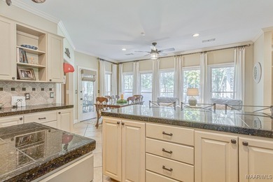 Nestled among mature trees and overlooking Wynlakes Golf Course on Wynlakes Golf and Country Club in Alabama - for sale on GolfHomes.com, golf home, golf lot