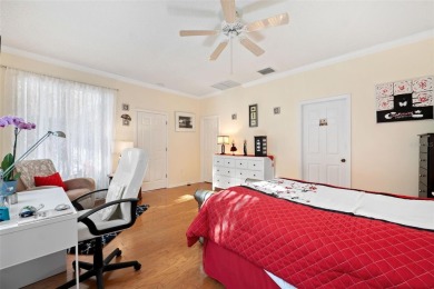 Welcome to this charming 3-bedroom, 2-bathroom WATERFRONT home on East Lake Woodlands Country Club in Florida - for sale on GolfHomes.com, golf home, golf lot
