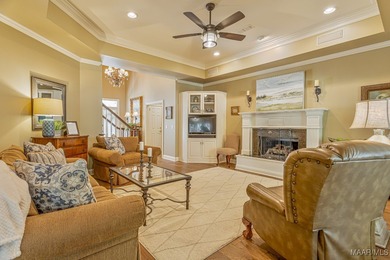 Nestled among mature trees and overlooking Wynlakes Golf Course on Wynlakes Golf and Country Club in Alabama - for sale on GolfHomes.com, golf home, golf lot