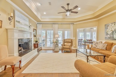 Nestled among mature trees and overlooking Wynlakes Golf Course on Wynlakes Golf and Country Club in Alabama - for sale on GolfHomes.com, golf home, golf lot