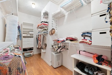 Welcome to this charming 3-bedroom, 2-bathroom WATERFRONT home on East Lake Woodlands Country Club in Florida - for sale on GolfHomes.com, golf home, golf lot