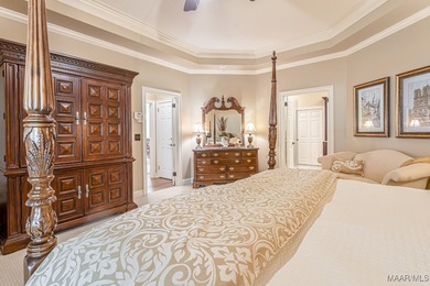 Nestled among mature trees and overlooking Wynlakes Golf Course on Wynlakes Golf and Country Club in Alabama - for sale on GolfHomes.com, golf home, golf lot