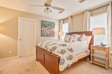 Nestled among mature trees and overlooking Wynlakes Golf Course on Wynlakes Golf and Country Club in Alabama - for sale on GolfHomes.com, golf home, golf lot