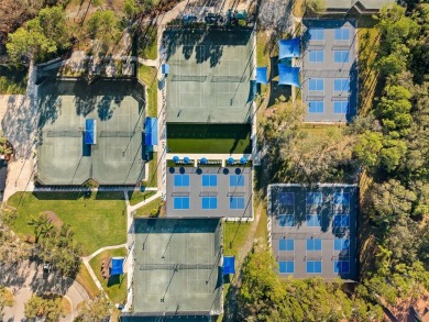 Welcome to this charming 3-bedroom, 2-bathroom WATERFRONT home on East Lake Woodlands Country Club in Florida - for sale on GolfHomes.com, golf home, golf lot