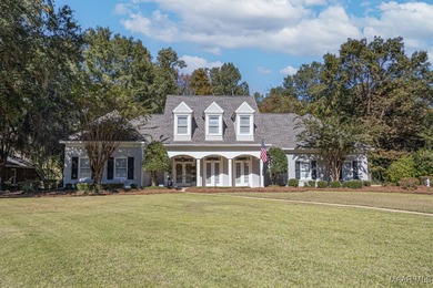 Nestled among mature trees and overlooking Wynlakes Golf Course on Wynlakes Golf and Country Club in Alabama - for sale on GolfHomes.com, golf home, golf lot