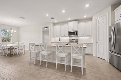 GOLF COURSE HOME WITH NO CARPET, IMPACT WINDOWS, AND 2.5-CAR on Herons Glen Golf and Country Club in Florida - for sale on GolfHomes.com, golf home, golf lot