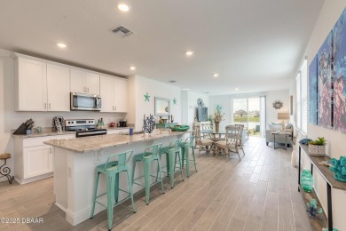 Stunning 4 bedroom, 2 bath lakefront home is nestled in the on LPGA International Golf Course in Florida - for sale on GolfHomes.com, golf home, golf lot