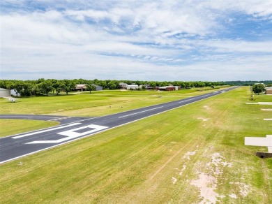 RUNWAY LIVING AT ITS FINEST!  Live where you fly in this on Pecan Plantation Country Club in Texas - for sale on GolfHomes.com, golf home, golf lot