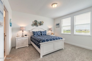 Stunning 4 bedroom, 2 bath lakefront home is nestled in the on LPGA International Golf Course in Florida - for sale on GolfHomes.com, golf home, golf lot