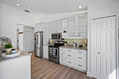 Fully updated 2-bedroom, 2-bath residence on Club House Drive on Palm Harbor Golf Club in Florida - for sale on GolfHomes.com, golf home, golf lot