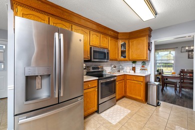 This beautiful home features luxury vinyl plank and ceramic on Beech Creek Golf Club in South Carolina - for sale on GolfHomes.com, golf home, golf lot