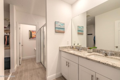 Stunning 4 bedroom, 2 bath lakefront home is nestled in the on LPGA International Golf Course in Florida - for sale on GolfHomes.com, golf home, golf lot