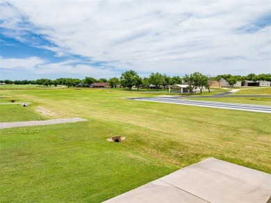 RUNWAY LIVING AT ITS FINEST!  Live where you fly in this on Pecan Plantation Country Club in Texas - for sale on GolfHomes.com, golf home, golf lot