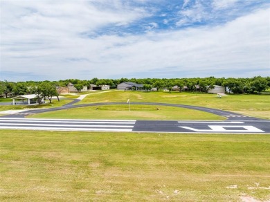 RUNWAY LIVING AT ITS FINEST!  Live where you fly in this on Pecan Plantation Country Club in Texas - for sale on GolfHomes.com, golf home, golf lot
