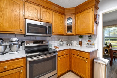 This beautiful home features luxury vinyl plank and ceramic on Beech Creek Golf Club in South Carolina - for sale on GolfHomes.com, golf home, golf lot