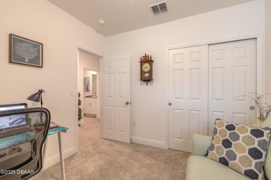 Stunning 4 bedroom, 2 bath lakefront home is nestled in the on LPGA International Golf Course in Florida - for sale on GolfHomes.com, golf home, golf lot