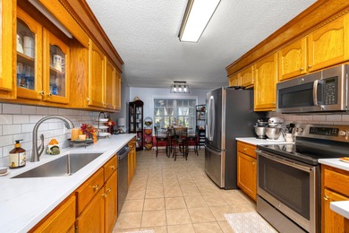 This beautiful home features luxury vinyl plank and ceramic on Beech Creek Golf Club in South Carolina - for sale on GolfHomes.com, golf home, golf lot