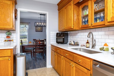 This beautiful home features luxury vinyl plank and ceramic on Beech Creek Golf Club in South Carolina - for sale on GolfHomes.com, golf home, golf lot