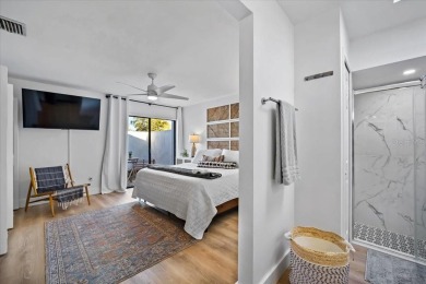 Fully updated 2-bedroom, 2-bath residence on Club House Drive on Palm Harbor Golf Club in Florida - for sale on GolfHomes.com, golf home, golf lot