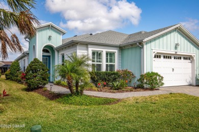 Escape to Paradise in this Barbuda Villa on a POND! This beauty on LPGA International Golf Course in Florida - for sale on GolfHomes.com, golf home, golf lot