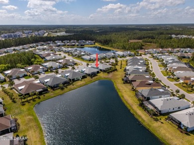 Escape to Paradise in this Barbuda Villa on a POND! This beauty on LPGA International Golf Course in Florida - for sale on GolfHomes.com, golf home, golf lot