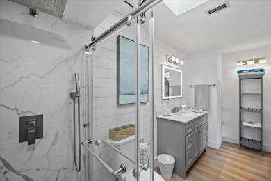 Fully updated 2-bedroom, 2-bath residence on Club House Drive on Palm Harbor Golf Club in Florida - for sale on GolfHomes.com, golf home, golf lot