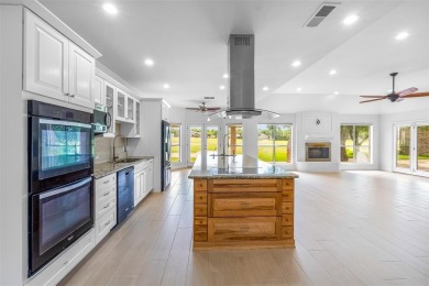 RUNWAY LIVING AT ITS FINEST!  Live where you fly in this on Pecan Plantation Country Club in Texas - for sale on GolfHomes.com, golf home, golf lot