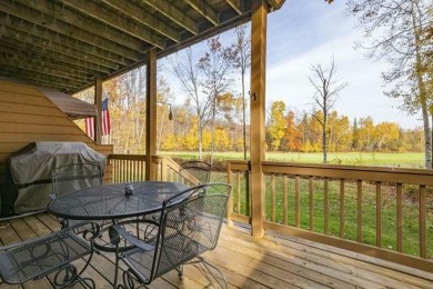 Vista Del Verde #4 is a peaceful corner condo that overlooks the on Schuss Mountain Golf Club in Michigan - for sale on GolfHomes.com, golf home, golf lot