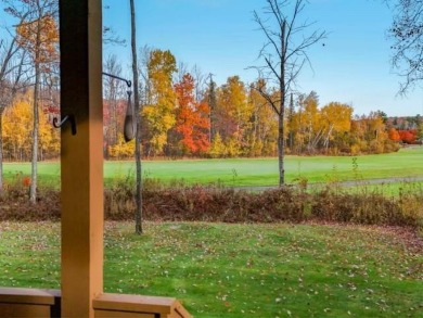 Vista Del Verde #4 is a peaceful corner condo that overlooks the on Schuss Mountain Golf Club in Michigan - for sale on GolfHomes.com, golf home, golf lot