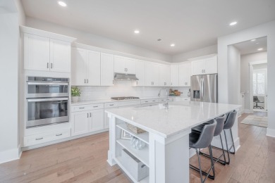 This stunning home is perfectly designed to enjoy all the on Charleston National Golf Club in South Carolina - for sale on GolfHomes.com, golf home, golf lot