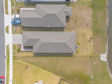 Stunning 4 bedroom, 2 bath lakefront home is nestled in the on LPGA International Golf Course in Florida - for sale on GolfHomes.com, golf home, golf lot