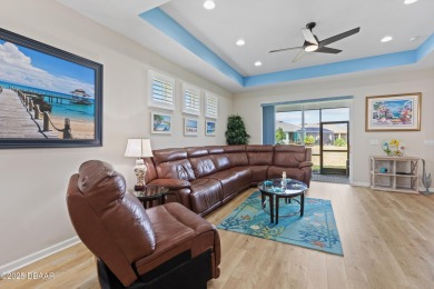 Escape to Paradise in this Barbuda Villa on a POND! This beauty on LPGA International Golf Course in Florida - for sale on GolfHomes.com, golf home, golf lot