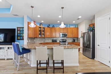 Escape to Paradise in this Barbuda Villa on a POND! This beauty on LPGA International Golf Course in Florida - for sale on GolfHomes.com, golf home, golf lot