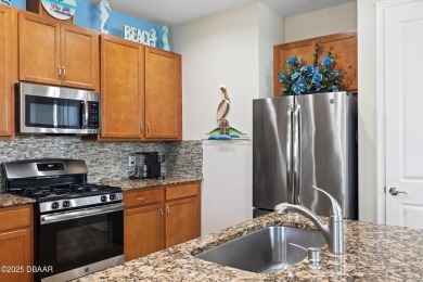 Escape to Paradise in this Barbuda Villa on a POND! This beauty on LPGA International Golf Course in Florida - for sale on GolfHomes.com, golf home, golf lot