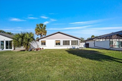 Fully updated 2-bedroom, 2-bath residence on Club House Drive on Palm Harbor Golf Club in Florida - for sale on GolfHomes.com, golf home, golf lot