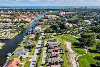 Fully updated 2-bedroom, 2-bath residence on Club House Drive on Palm Harbor Golf Club in Florida - for sale on GolfHomes.com, golf home, golf lot