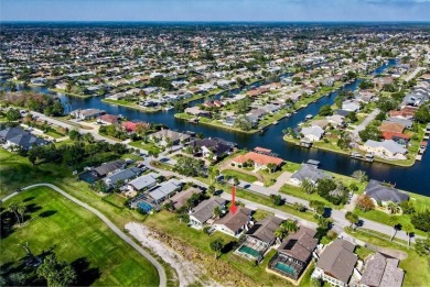 Fully updated 2-bedroom, 2-bath residence on Club House Drive on Palm Harbor Golf Club in Florida - for sale on GolfHomes.com, golf home, golf lot