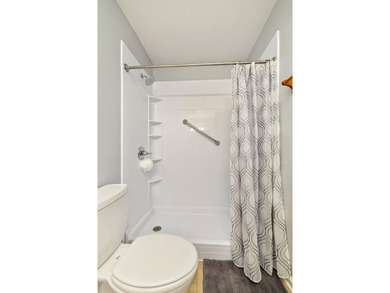 This beautiful home features luxury vinyl plank and ceramic on Beech Creek Golf Club in South Carolina - for sale on GolfHomes.com, golf home, golf lot