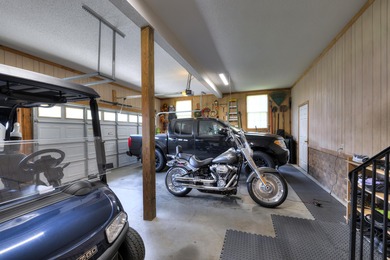 This beautiful home features luxury vinyl plank and ceramic on Beech Creek Golf Club in South Carolina - for sale on GolfHomes.com, golf home, golf lot