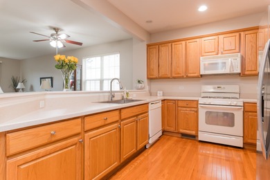 Welcome to this beautifully maintained 2-bedroom, 2-bath ranch on Whisper Creek Golf Club in Illinois - for sale on GolfHomes.com, golf home, golf lot