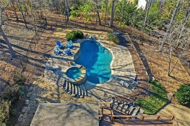 Don't miss the opportunity to own this gem in Towne Lake Hills on Towne Lake Hills Golf Club in Georgia - for sale on GolfHomes.com, golf home, golf lot