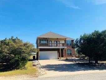 Wonderful vacation home with an amazing view of Possum Kingdom on The Cliffs Resort in Texas - for sale on GolfHomes.com, golf home, golf lot