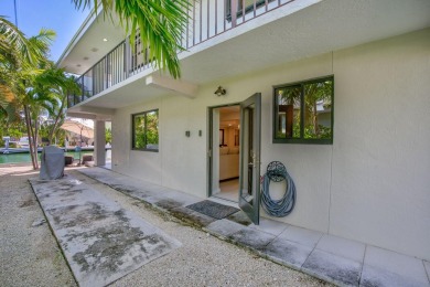 Full Duplex: Live in the gorgeous, NEW, lower level, which is on Key Colony Beach Golf Course in Florida - for sale on GolfHomes.com, golf home, golf lot