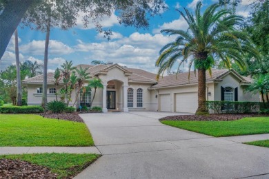 Exceptional home located on the 14th green of the Fazio designed on Hunters Green Country Club in Florida - for sale on GolfHomes.com, golf home, golf lot