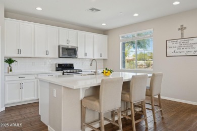 This pristine, modern 3-bed, 3-bath home sits on a quiet street on Trilogy Golf Club At Vistancia in Arizona - for sale on GolfHomes.com, golf home, golf lot